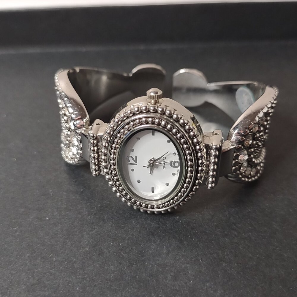 6 Inch Pretty Silver Tone Cuff Watch With White Dial